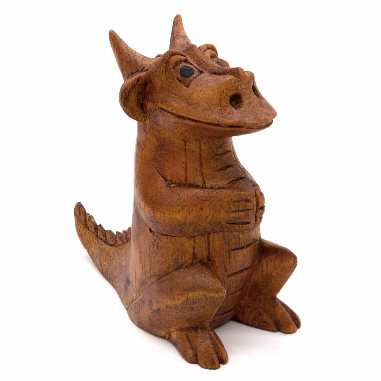 Amber-stained wood dragon carving, seated upright, three-quarter front view, Indonesia