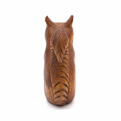 Squirrel wood carving, rear view showing carved striped tail curling up the back, Indonesia