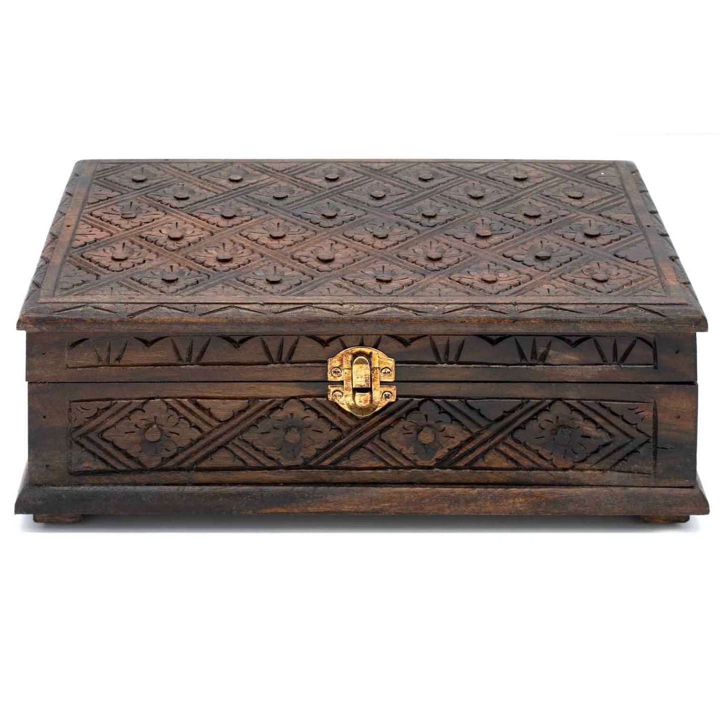 Dark carved wood jewellery box closed, front view showing brass toggle clasp and diamond-flower relief on sides