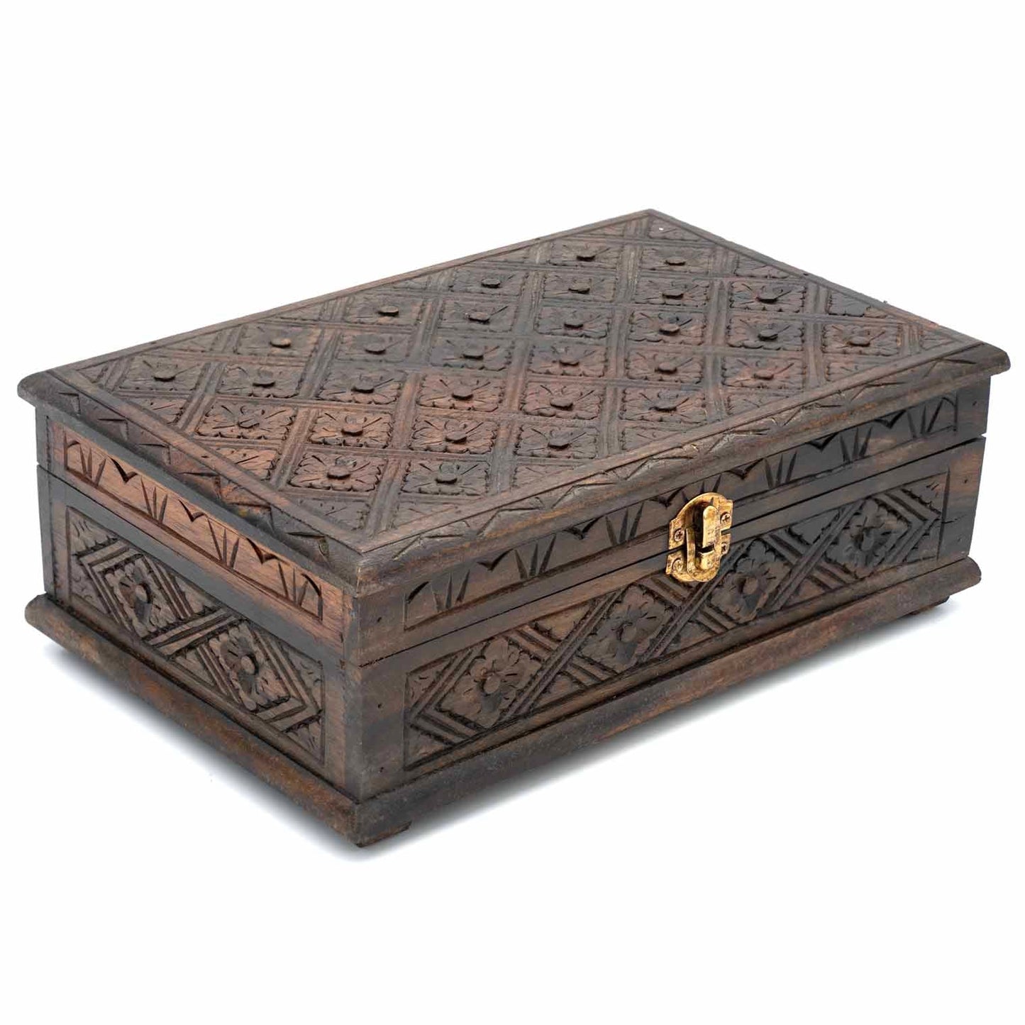 Three-quarter view of carved wooden jewellery box showing geometric floral pattern across lid and sides