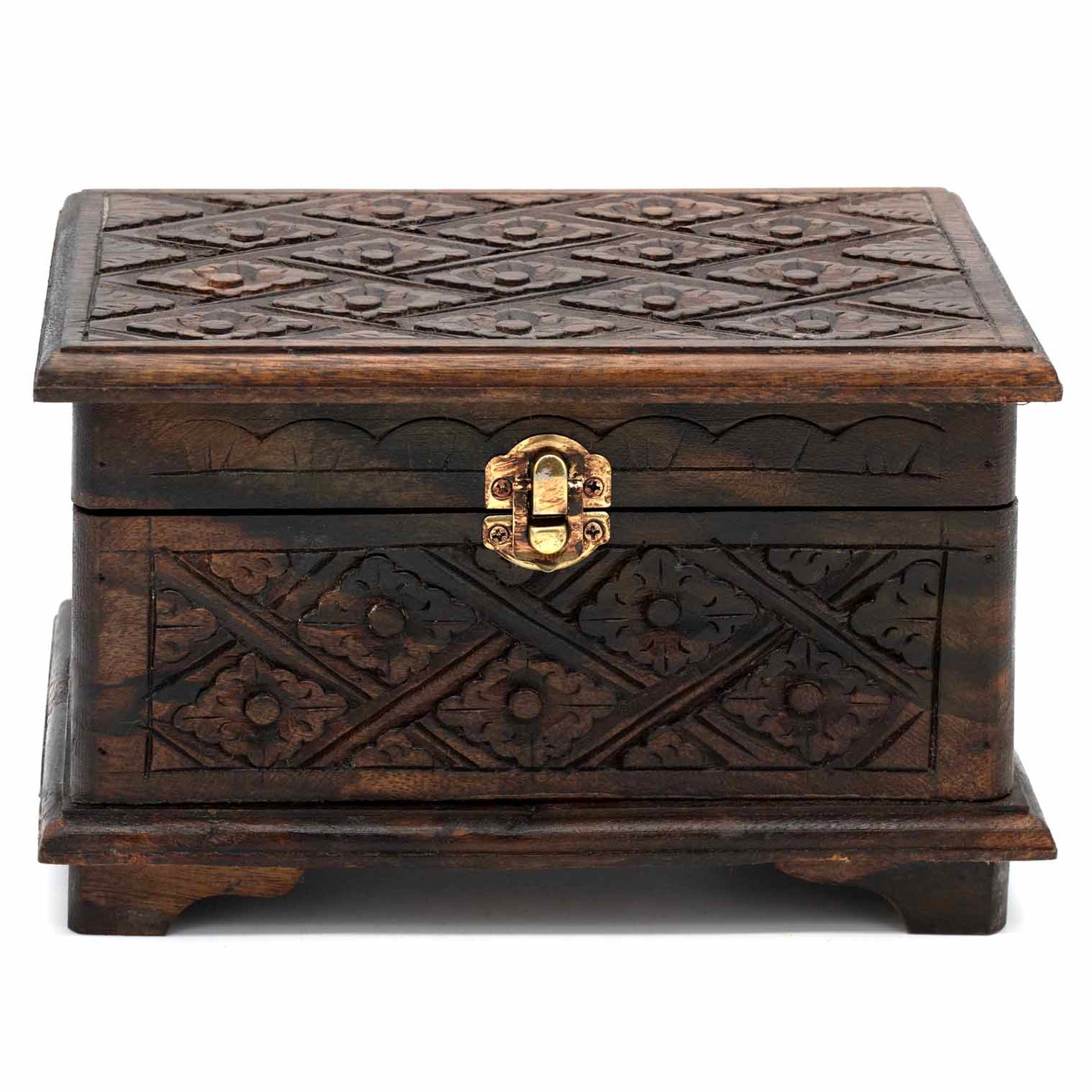 Small carved wood jewellery chest on bracket feet, front view showing brass clasp and diamond-flower relief carving