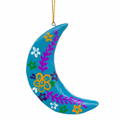 Teal hand-painted wood crescent moon, front view showing yellow, purple and white floral motifs, Bali Indonesia