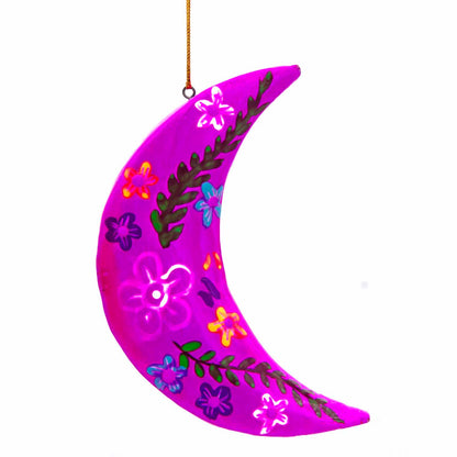 Magenta hand-painted wood crescent moon, front view with multicolour floral motifs, Bali Indonesia