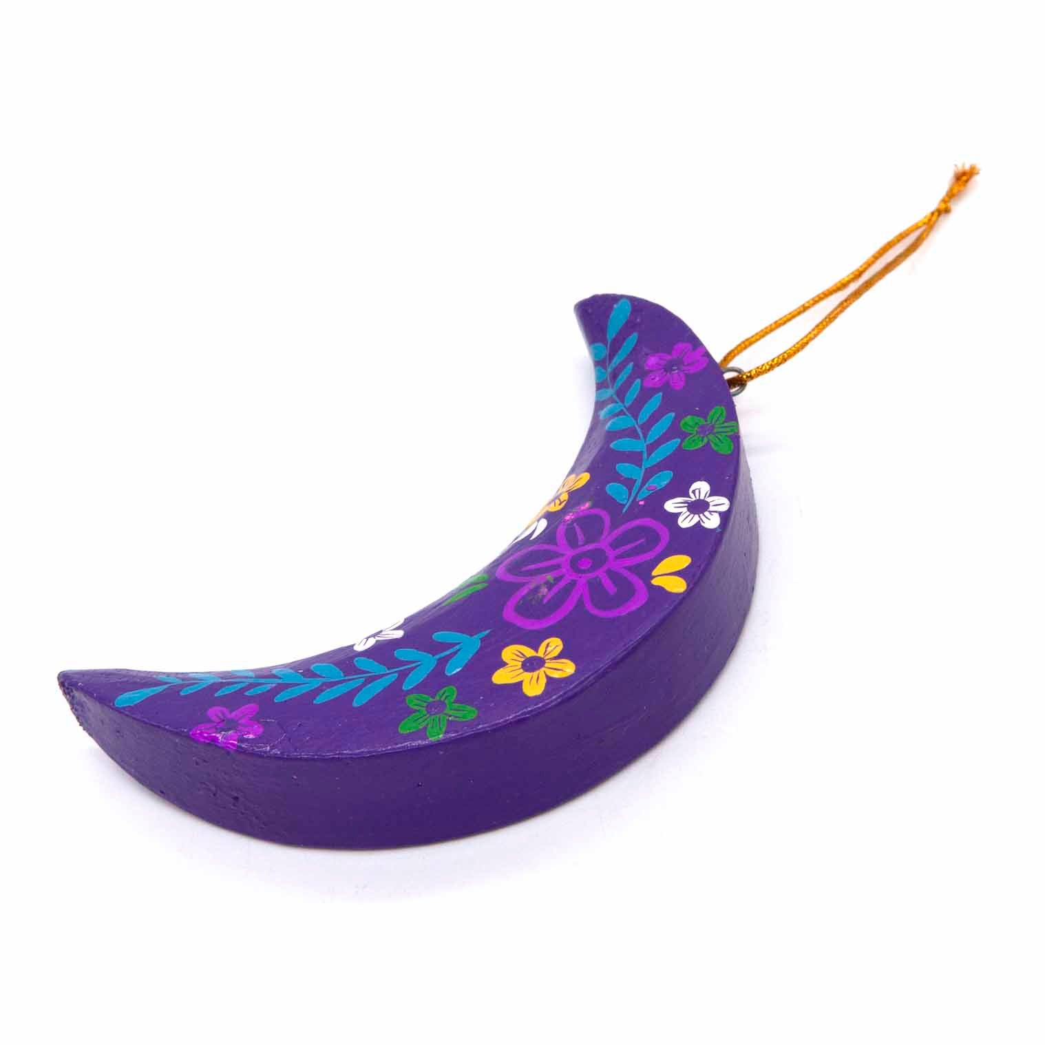 Purple hand-painted wood crescent moon, angled side view showing depth and gold hanging cord