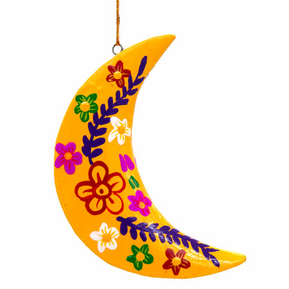 Yellow hand-painted wood crescent moon, front view with purple and white flower and leaf motifs, Bali