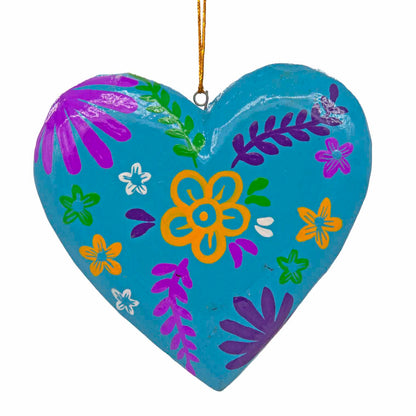 Teal hand-painted wood heart, front view showing yellow and purple folk flower motifs, Bali Indonesia