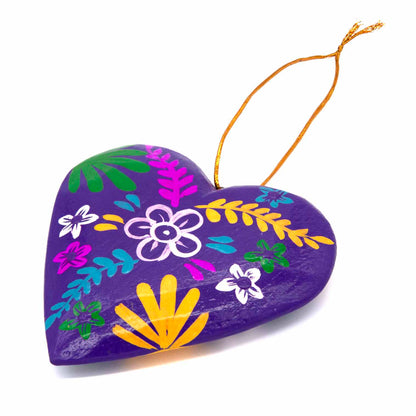 Deep purple hand-painted wood heart, angled side view showing folk flower detail and gold cord