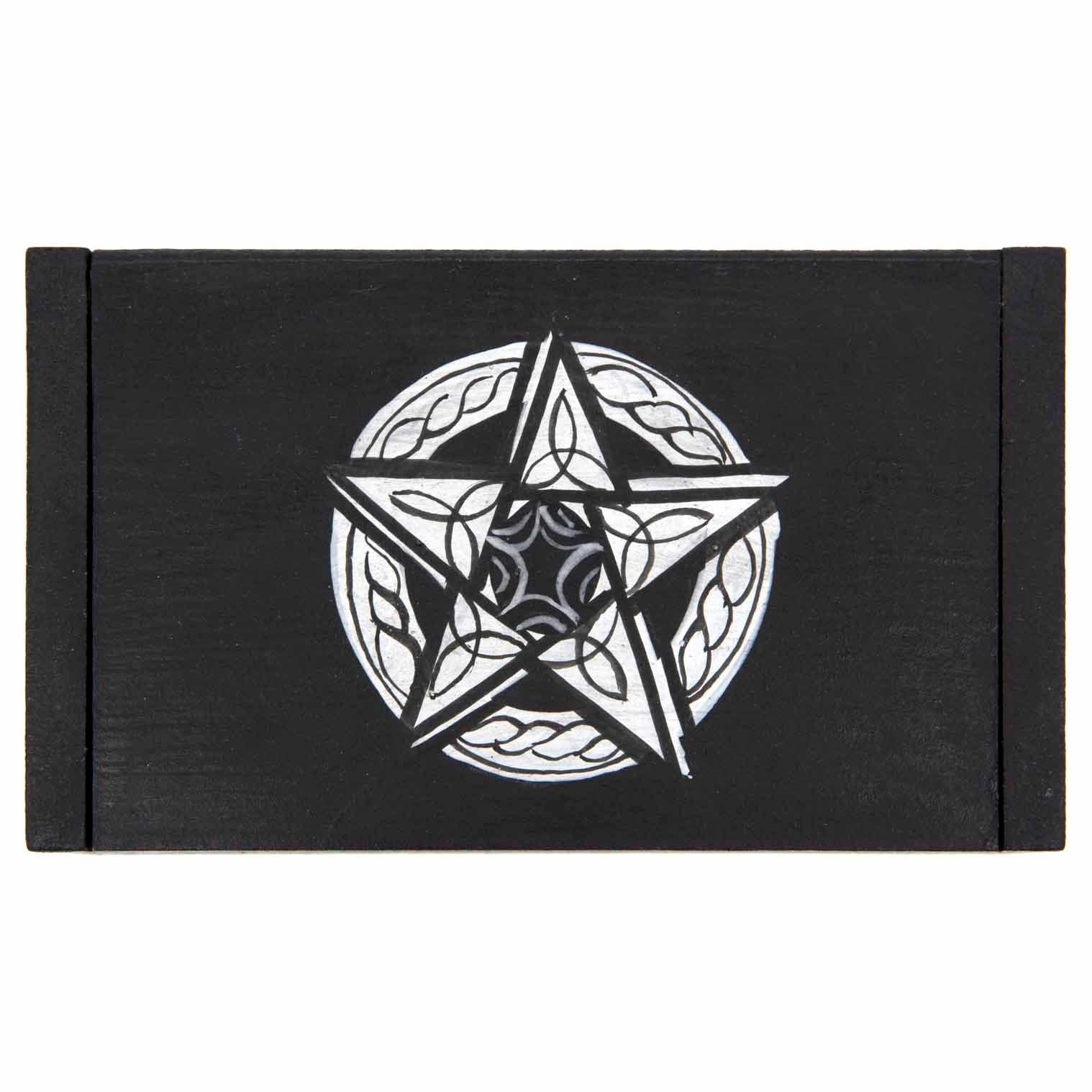 Top-down view of black wooden pentacle box showing full silver pentacle with knotwork and spiral detail on lid