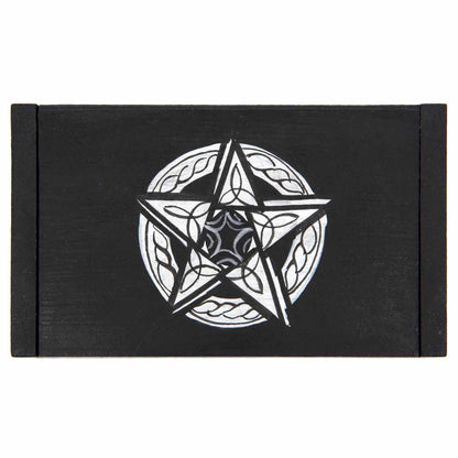 Top-down view of black wooden pentacle box showing full silver pentacle with knotwork and spiral detail on lid