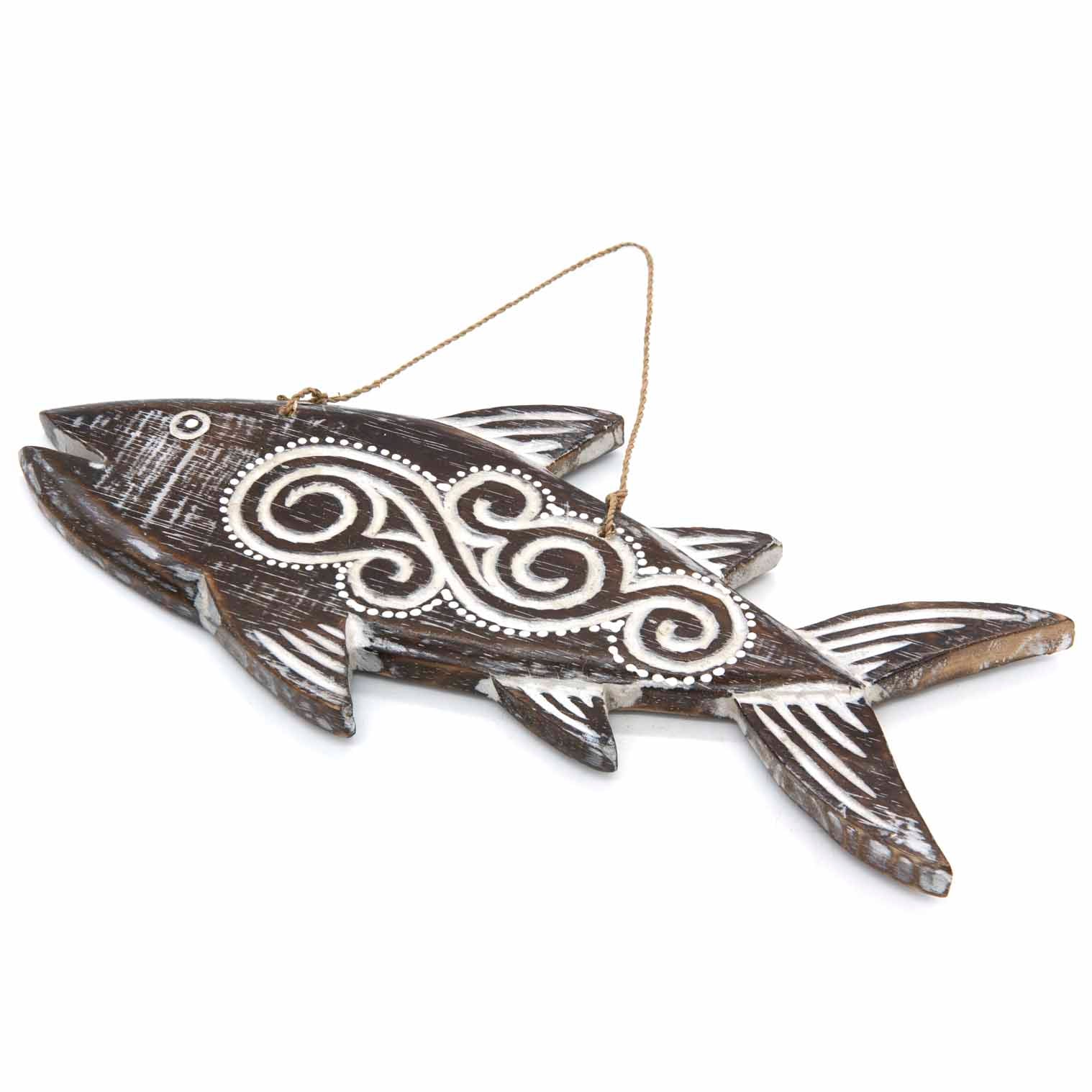 Hand-carved wooden fish plaque with flowing tribal-style relief carving, made by artisans in Bali, Indonesia