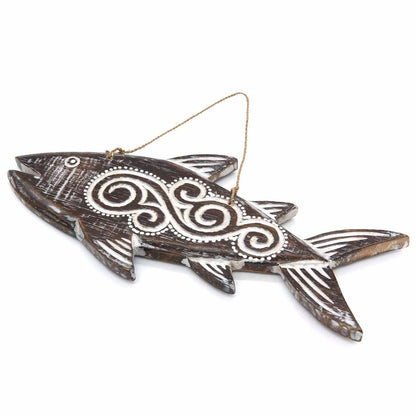 Hand-carved wooden fish plaque with flowing tribal-style relief carving, made by artisans in Bali, Indonesia