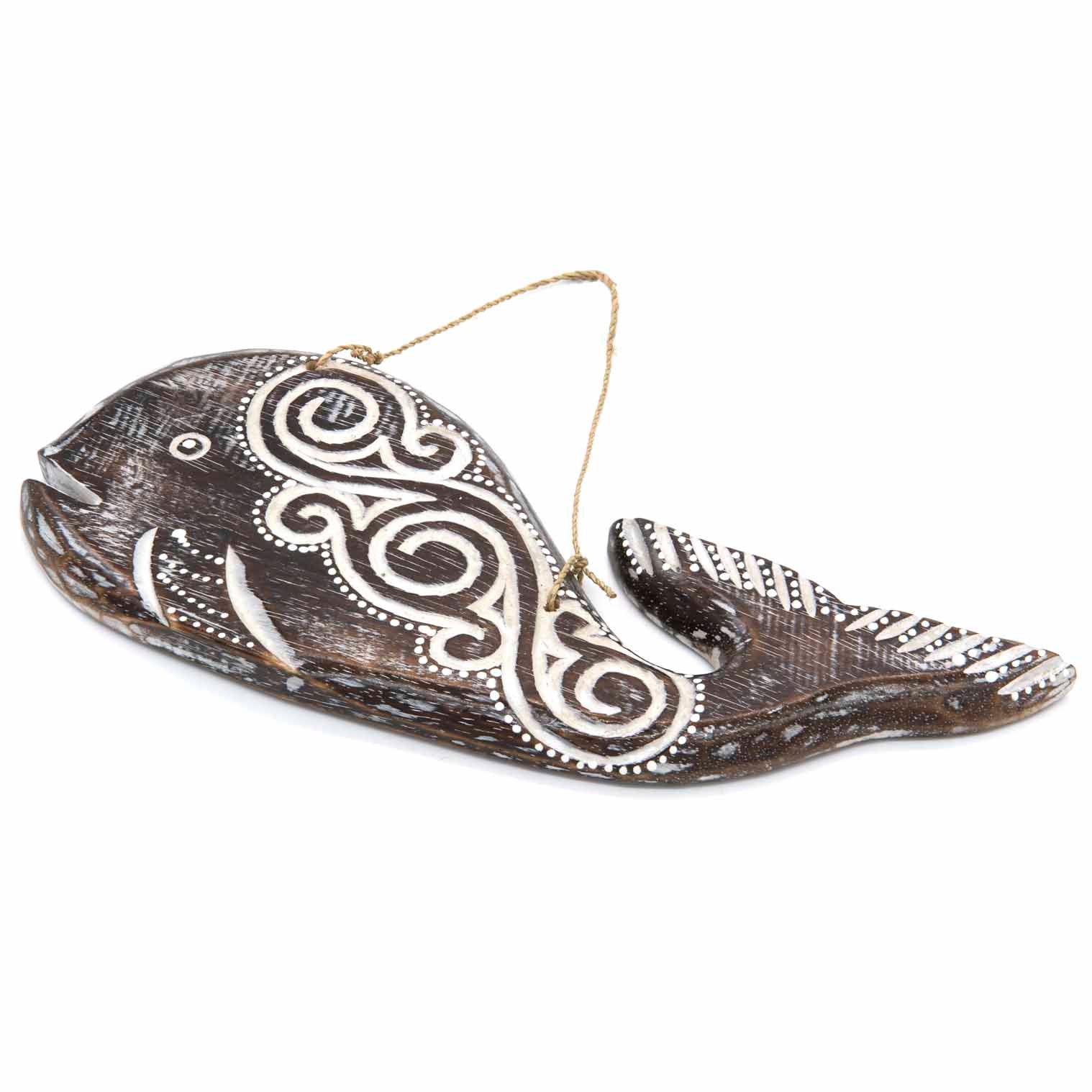 Round hand-carved wooden whale plaque with wave-like tribal-style relief carving, made by artisans in Bali, Indonesia