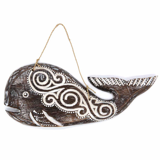 Round hand-carved wooden whale plaque with wave-like tribal-style relief carving, made by artisans in Bali, Indonesia