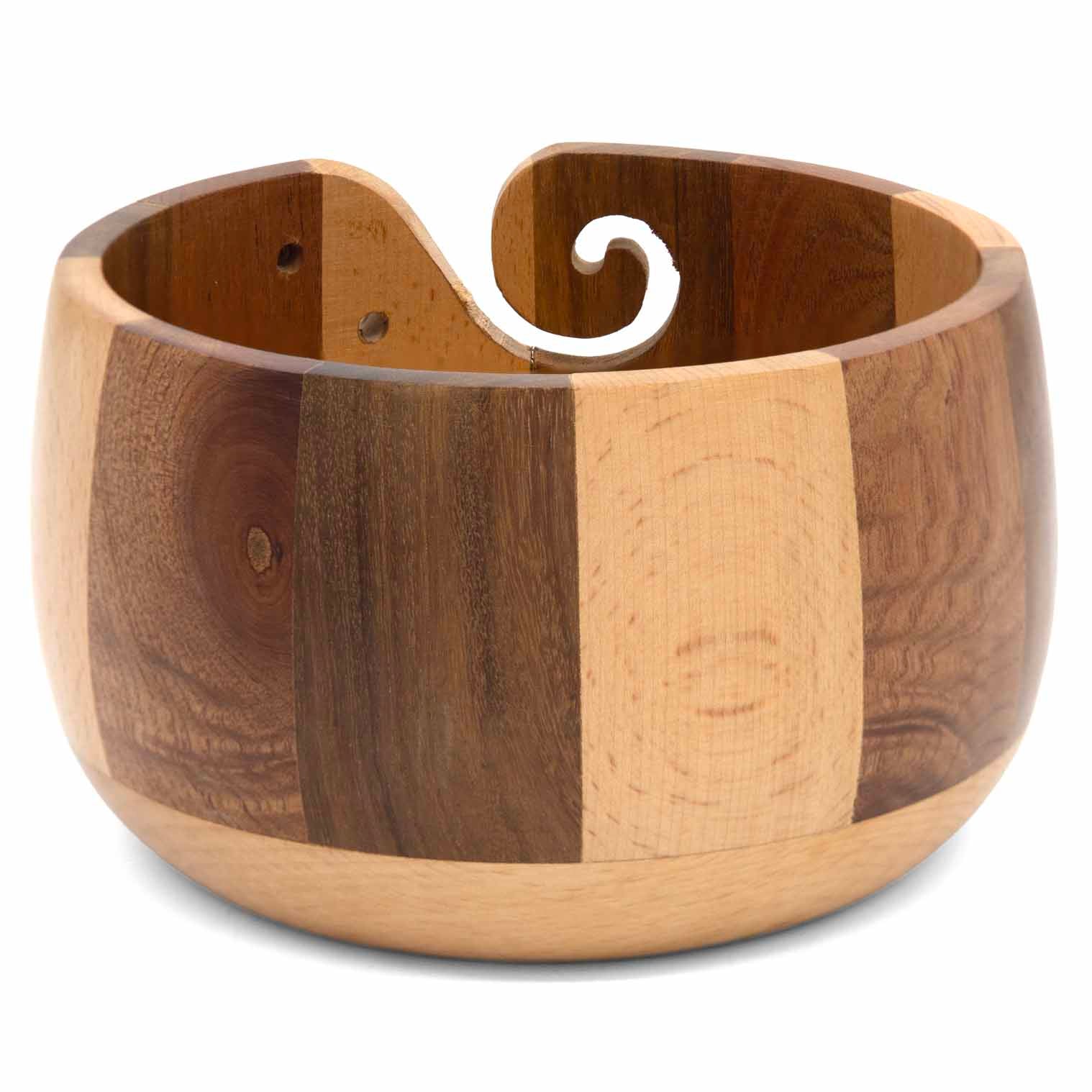 Side view of striped hardwood yarn bowl showing alternating wood tones and spiral slot detail