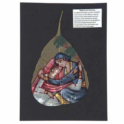 Hand-painted peepal leaf showing Indian miniature lovers scene in red, blue and gold, mounted on dark card, India