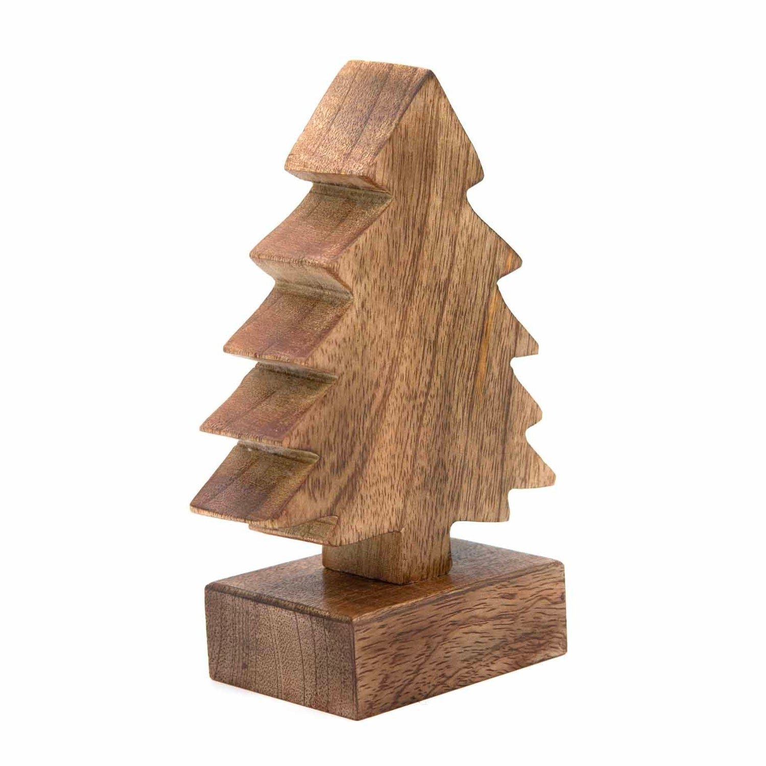 Small carved mango wood Christmas tree, three-quarter angle showing stepped branch profile and grain