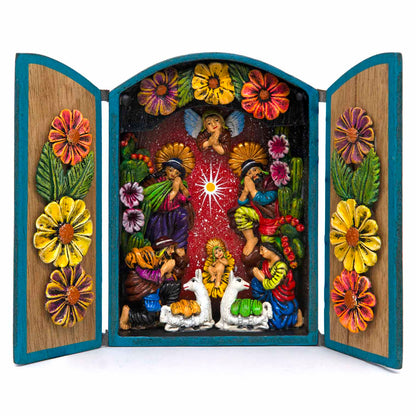 Arched nativity retablo fully open, front view, dense clay nativity scene with angel, Mary, Joseph and llamas, Peru