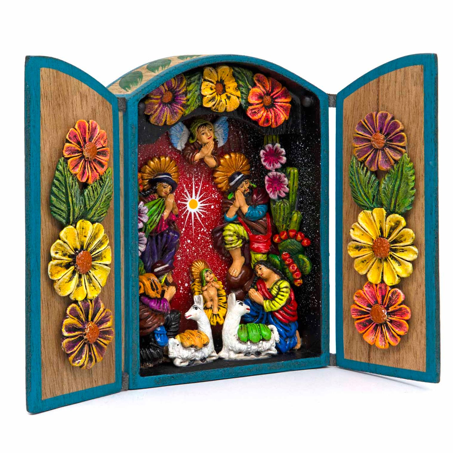 Nativity retablo open, three-quarter view showing depth of clay figures and painted red interior ground