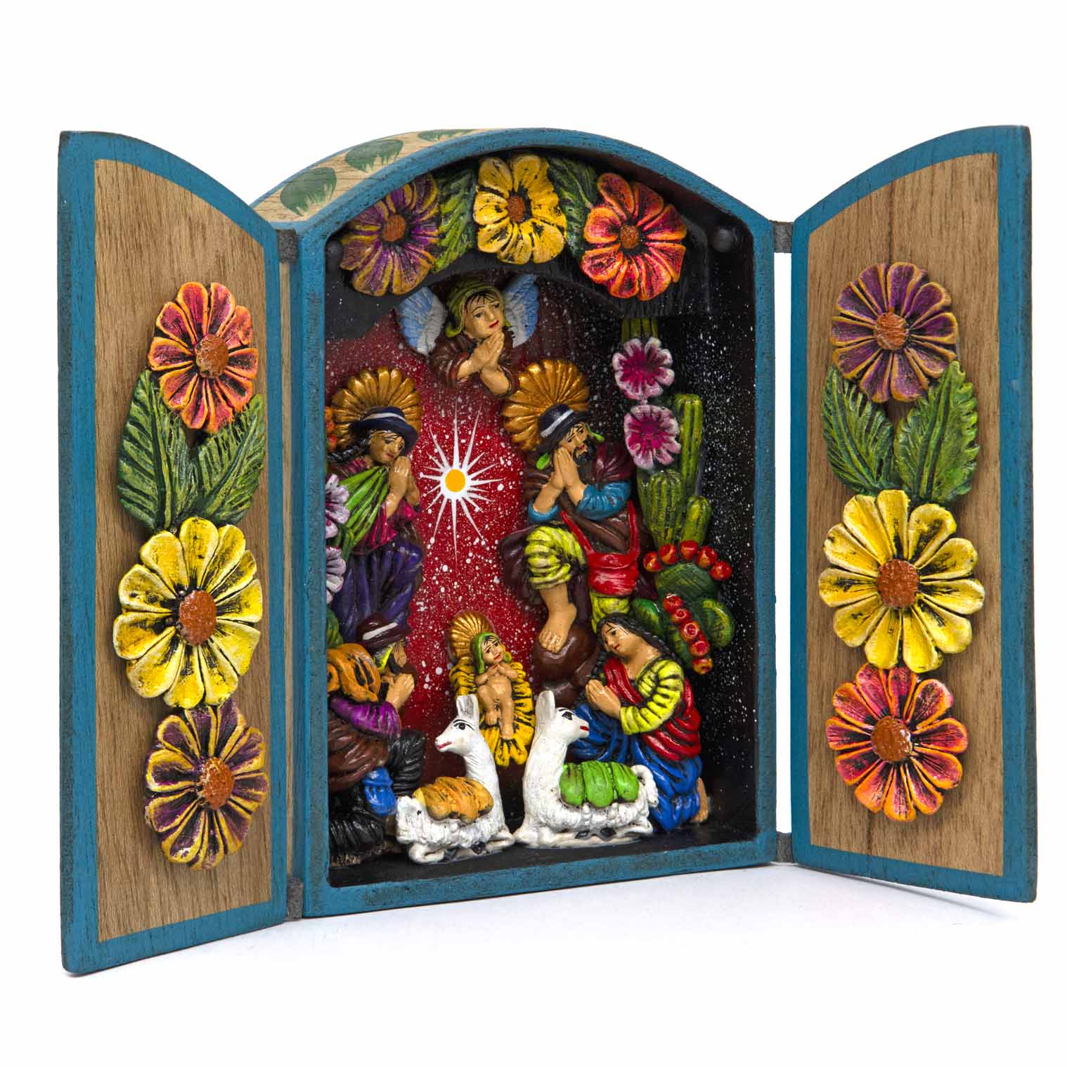 Nativity retablo open, three-quarter view showing depth of clay figures and painted red interior ground
