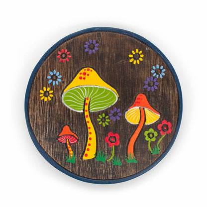 Front view of round wood mushroom plaque on white background, dark stain with multicolour painted fungi and daisy flowers