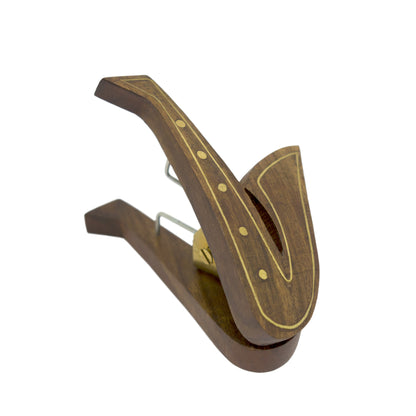 Saxophone-shaped music sheet clip hand-carved in rosewood with brass inlaid detailing and a sprung brass-fixed hinge