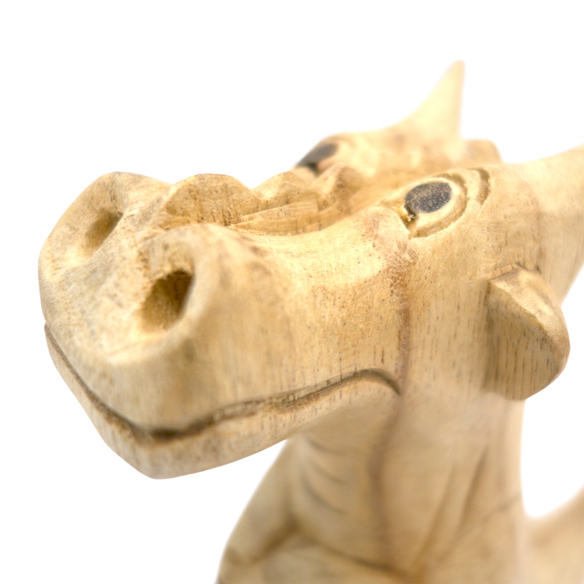 Large hand-carved wooden smoking dragon incense burner, a seated dragon with scaled back, clawed feet and curled tail, with smoke channels carved through the nostrils