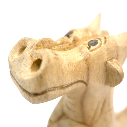 Large hand-carved wooden smoking dragon incense burner, a seated dragon with scaled back, clawed feet and curled tail, with smoke channels carved through the nostrils